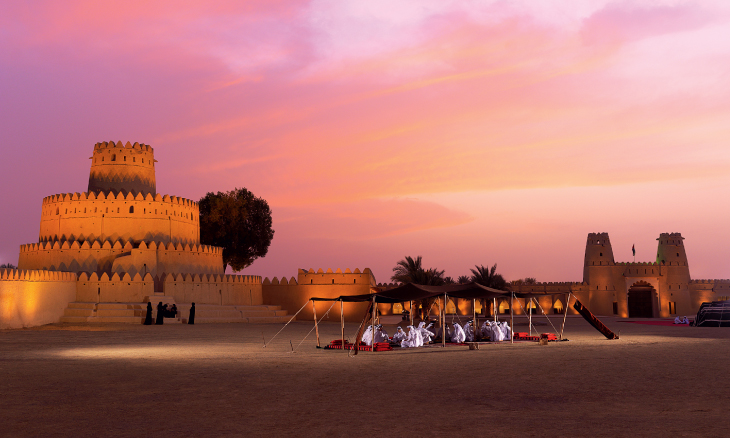 Ramadan in Abu Dhabi – Iftar tent with lanterns, dates, and sunset backdrop