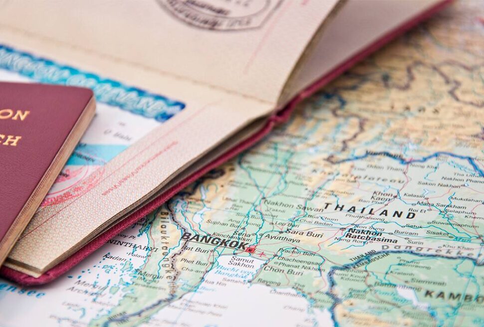 Traveler preparing documents required for Thailand visa from Dubai, including passport, ID, and booking confirmations, ready to apply from Dubai to Thailand.