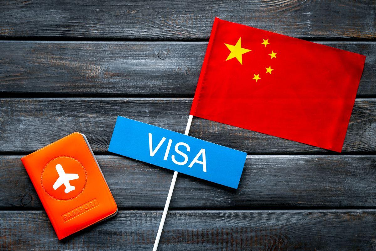 Traveler holding passport during China visa application in Dubai – guide for visa to China from Dubai and China tourist visa from Dubai.