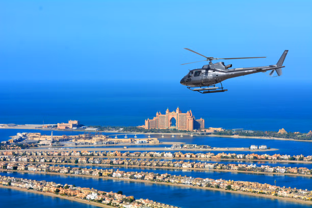 Dubai skyline from a Helicopter Ride Dubai soaring above Palm Jumeirah