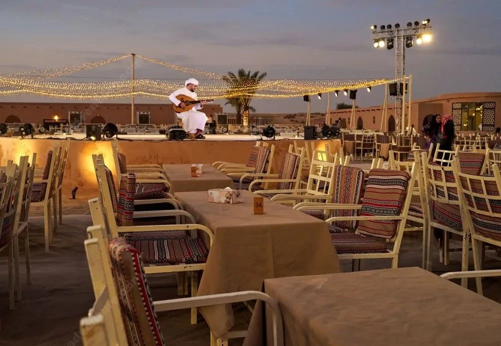 Sunset view of the best evening safari in Dubai with camel ride and desert camp