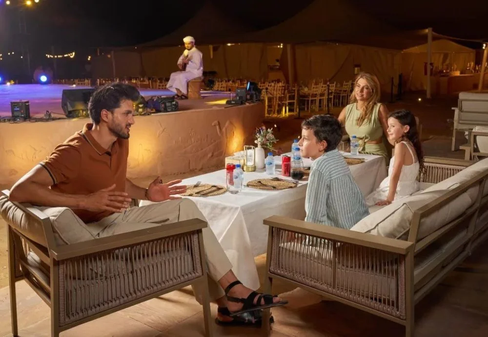 Evening desert safari with quad bike on golden dunes in Dubai