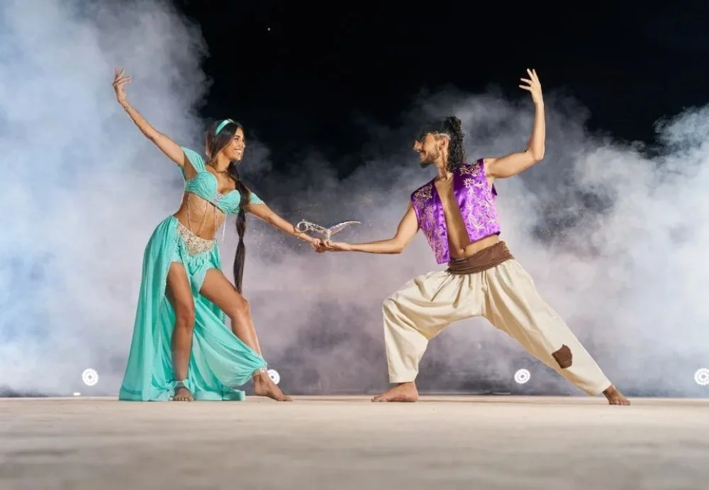 Sunday night Dubai desert safari with red dunes, camel ride, and camp lights