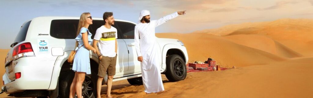 desert safari tours Dubai reviews guide with red dunes, 4x4 convoy, and camp lights