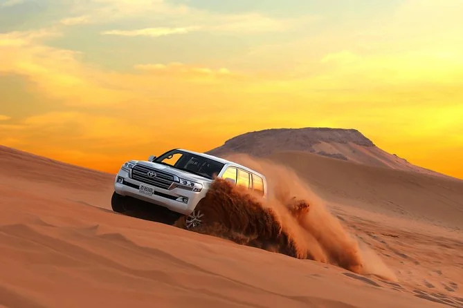 e9 › Forever Tourism LLC Dune bashing on Evening Desert Safari Tour
