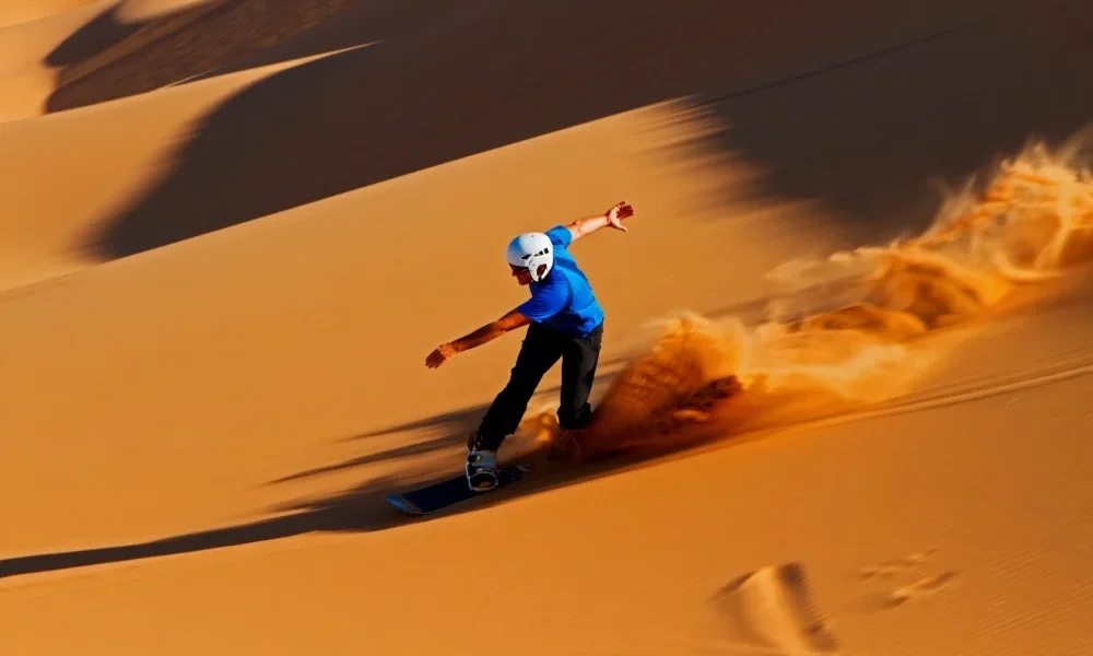 Thrilling sand sledding Dubai activity in the Arabian Desert