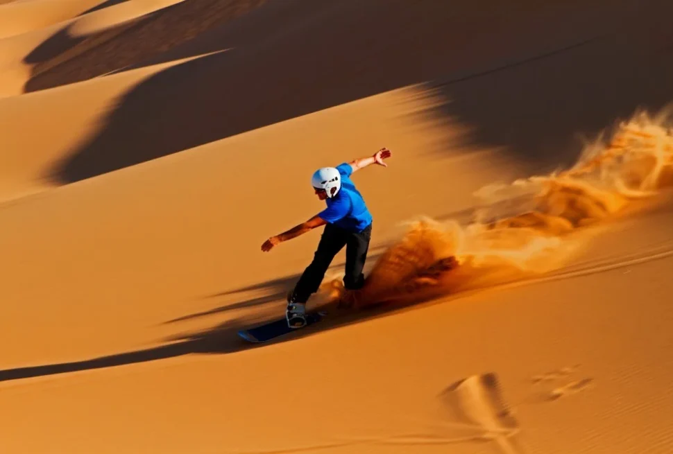 Thrilling sand sledding Dubai activity in the Arabian Desert