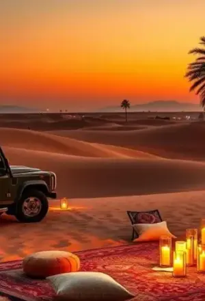 Arabian Safari Dubai with 4x4 on red dunes at sunset and lantern-lit camp