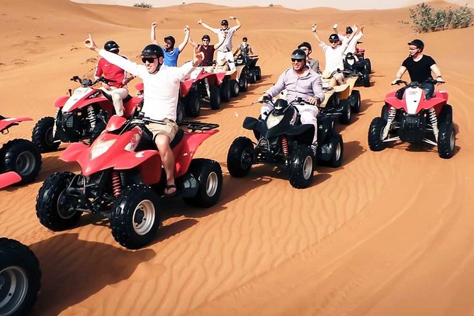 Group Adventure – Quad Bike Desert Safari Dubai › Forever Tourism LLC Group quad biking adventure during Quad Bike Desert Safari Dubai.