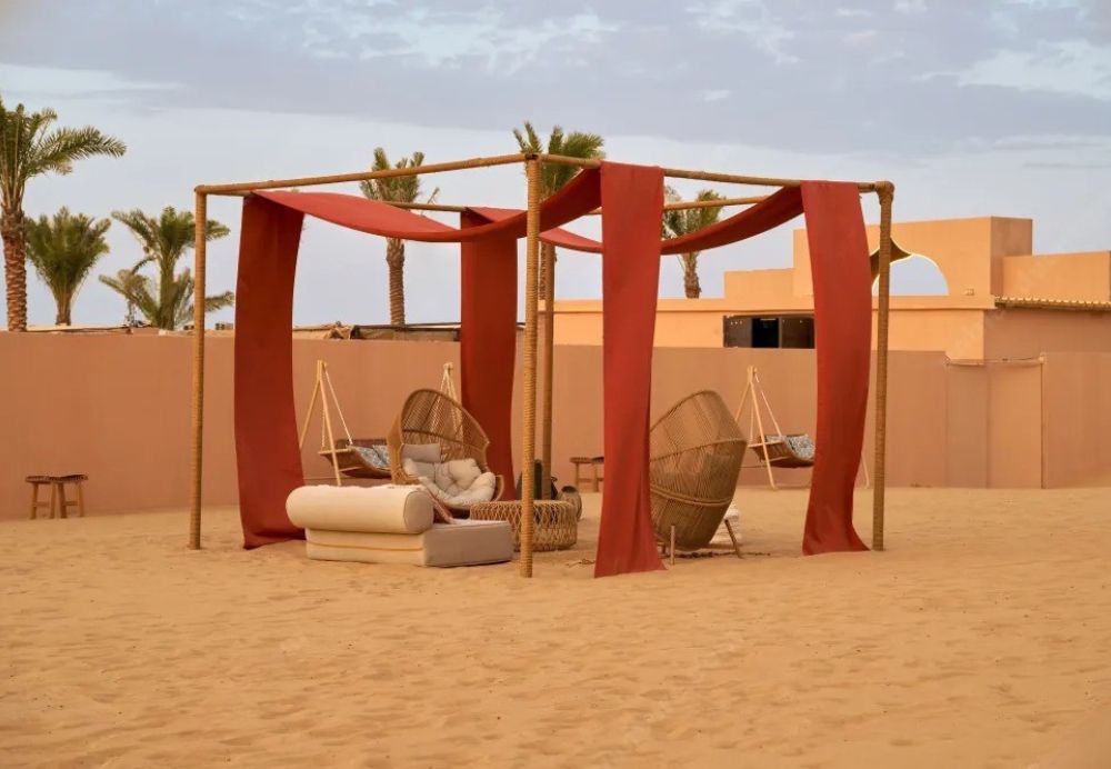 Desert Camp Experience – Relax in Style after Your Red Dune Safari › Forever Tourism LLC Cozy desert camp setup during a Red Dune Safari in Dubai