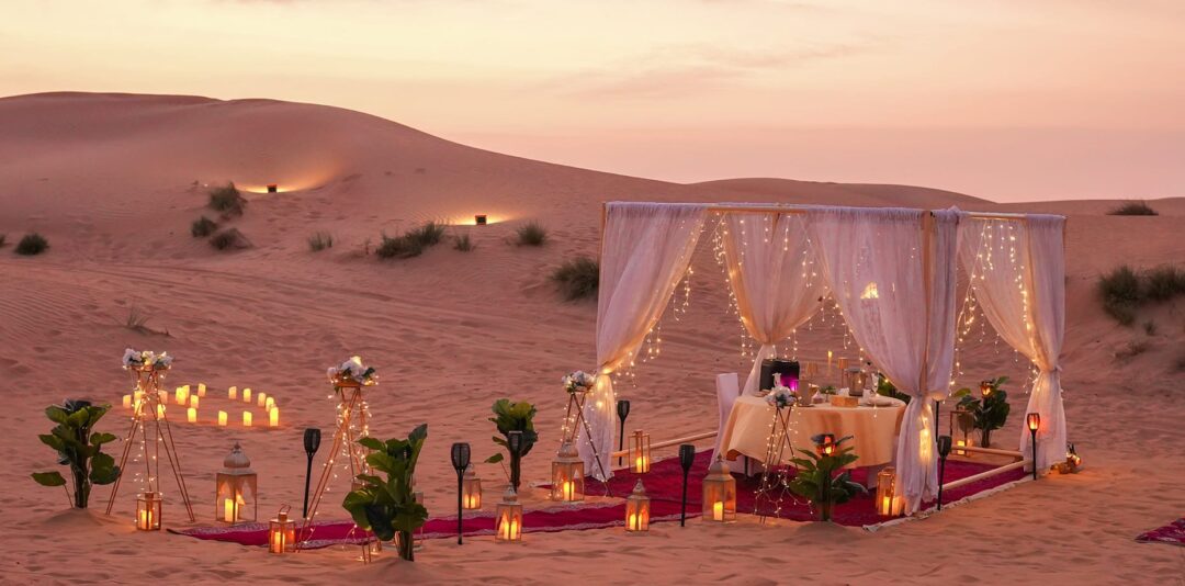 › Forever Tourism LLC Arabian Tours Dubai with 4×4 on red dunes, camel ride, and lantern-lit camp