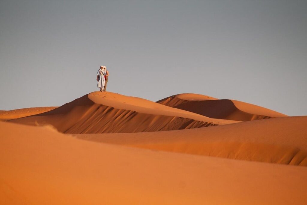 red sand desert safari at Lahbab with sunset ridge and 4x4 convoy