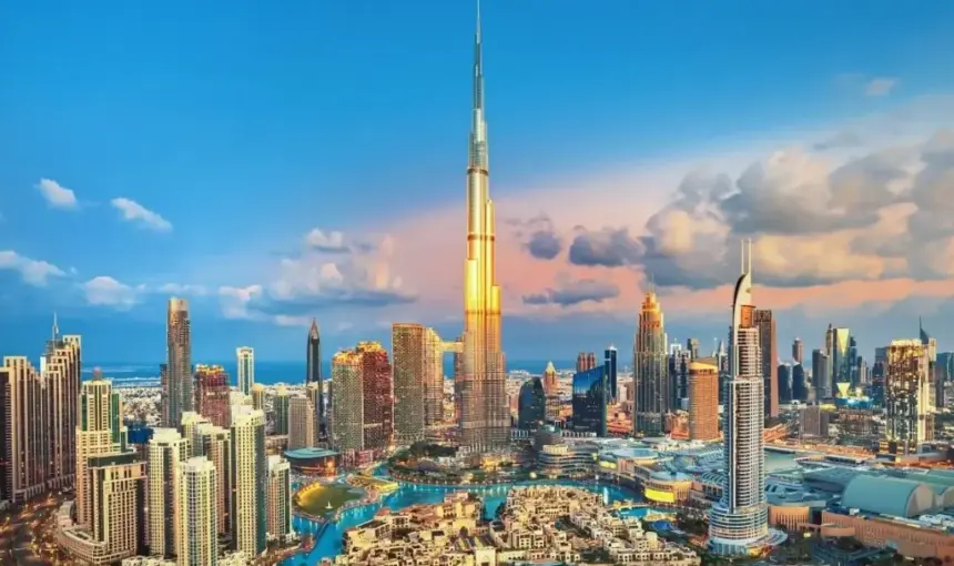 Dubai City Tours: Top Sights, Routes & Easy Booking › Forever Tourism LLC Dubai city tours with skyline view of Burj Khalifa, creek abra, and heritage lanes