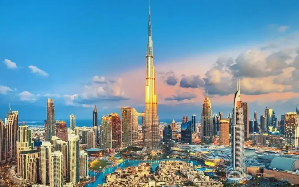 Dubai City Tours: Top Sights, Routes & Easy Booking › Forever Tourism LLC Dubai city tours with skyline view of Burj Khalifa, creek abra, and heritage lanes