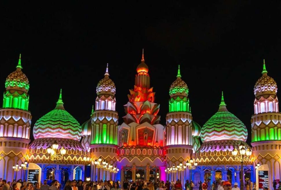global village online ticket booking for Dubai attraction with pavilions and lights