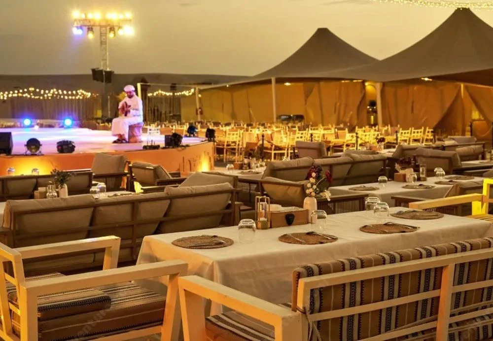 the desert safari Dubai with dune bashing, camel rides, and evening camp