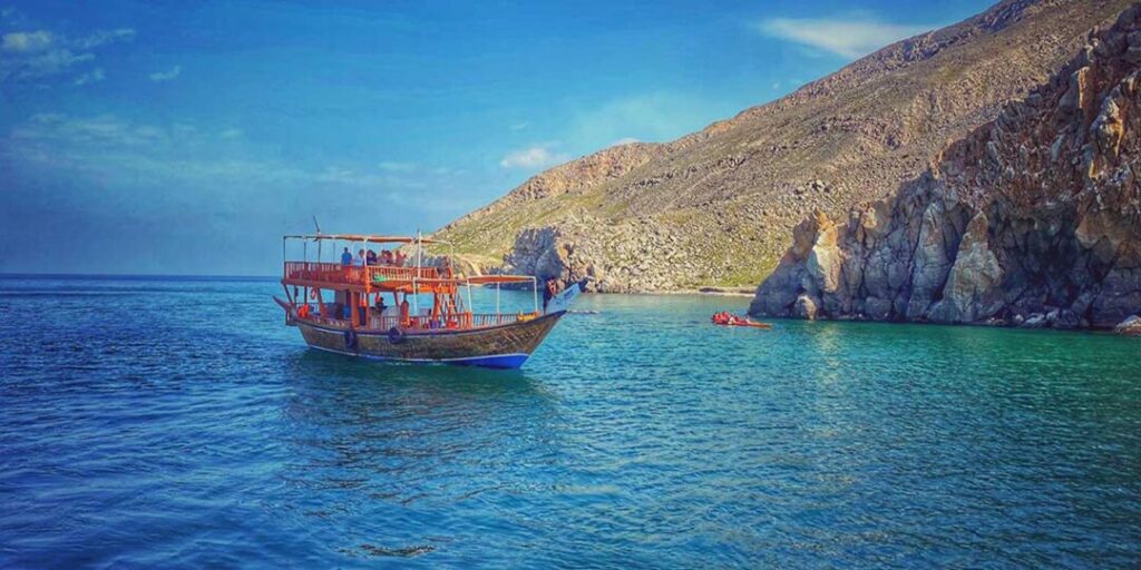 musandam-dhow-cruise › Forever Tourism LLC cruise from Dubai to Oman sailing across Arabian Sea with Musandam fjords