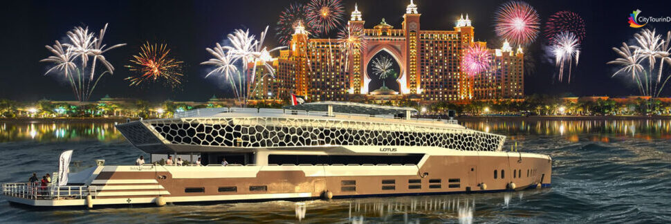 Lotus Cruise Dubai mega yacht dinner with city skyline and guests on deck