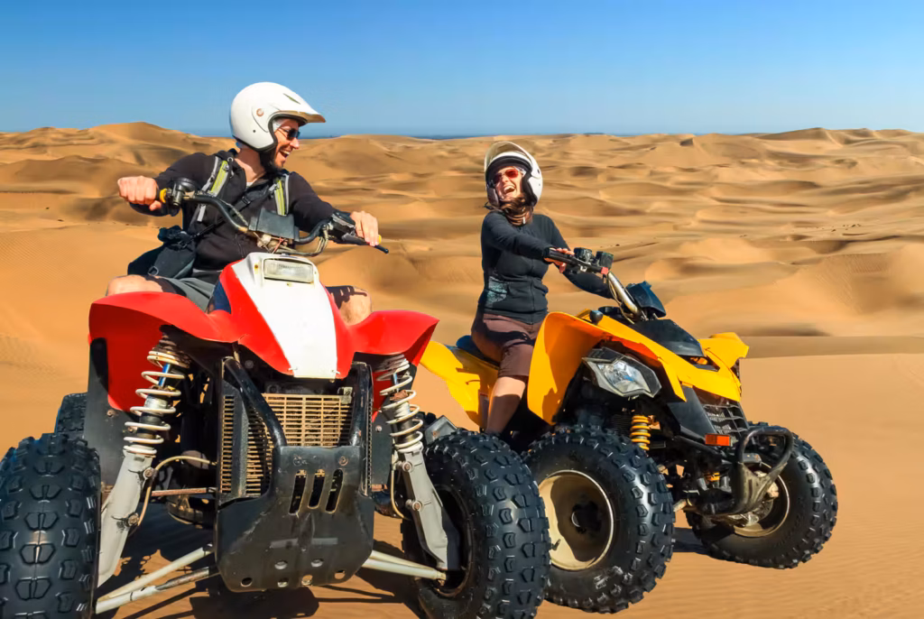Dubai desert safari booking with dune bashing, camel rides, and evening desert camp