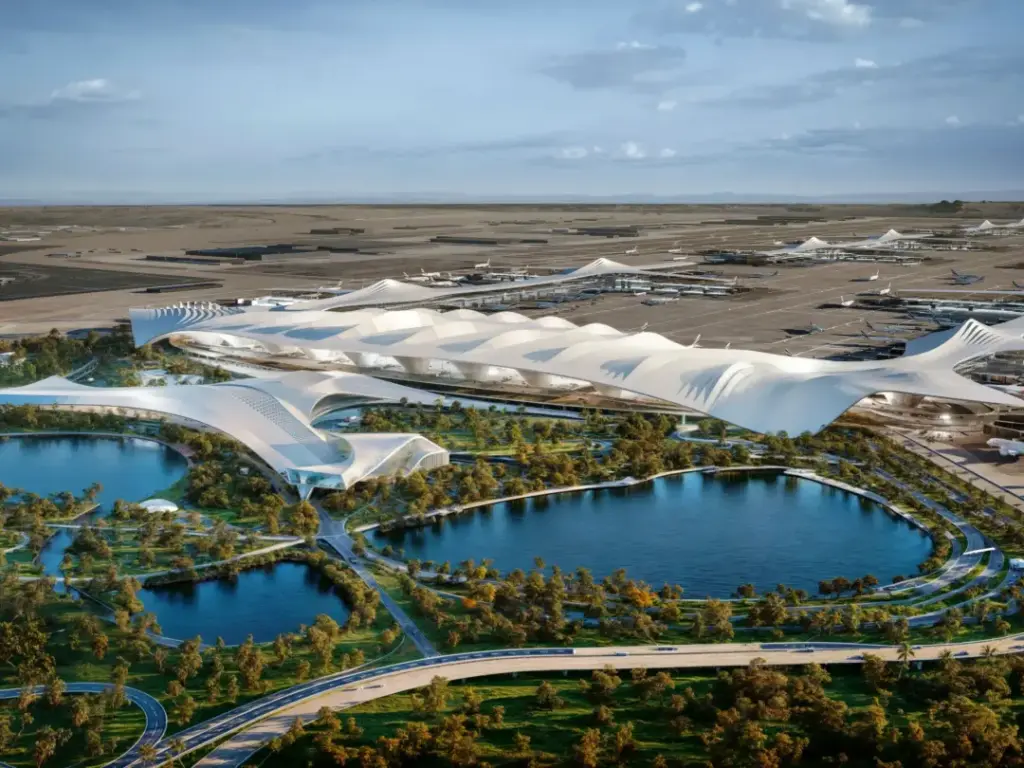 Dubai Airport terminal aerial view with modern architecture and aircraft parking areas