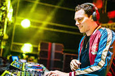 Top Events Dubai Calendar featuring a world-renowned DJ performing live at a major music event in Dubai