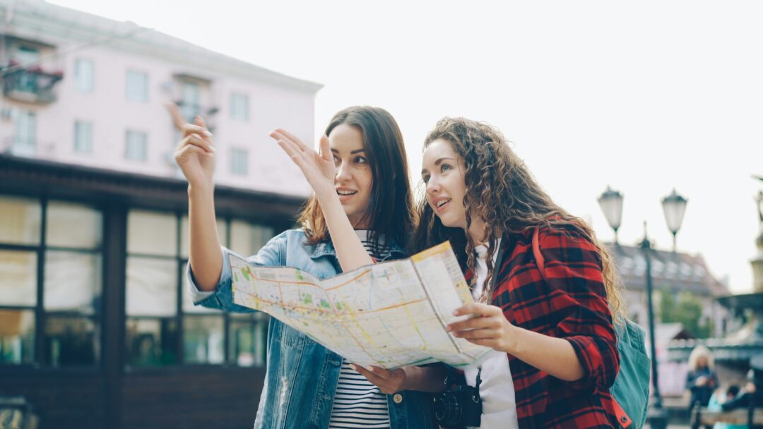 Two girls is finding routes - Forever Tourism makes a stress-free travel planning