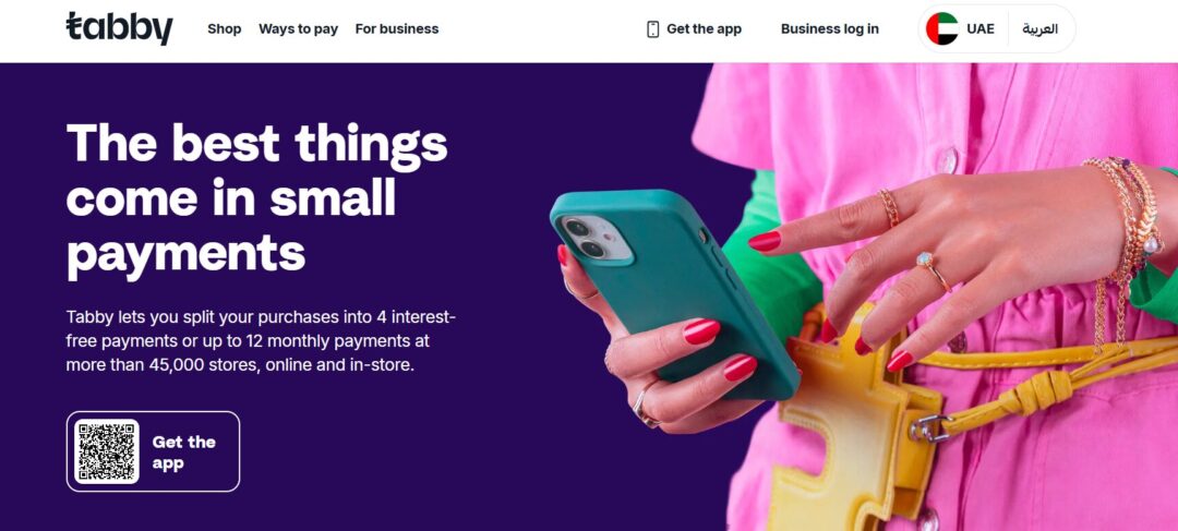 Hero banner promoting Tabby: 'The best things come in small payments' with a person in pink holding a teal phone on a purple background; QR app button on the left.