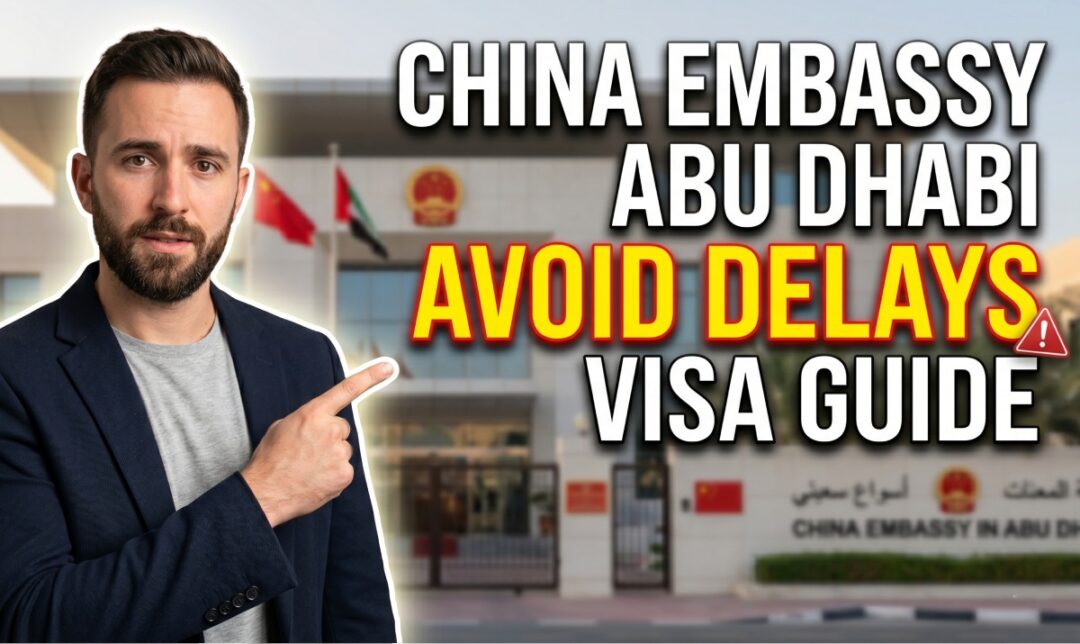 Thumbnail: man in a blazer pointing at the text 'China Embassy Abu Dhabi — Avoid Delays — Visa Guide' in front of a embassy building