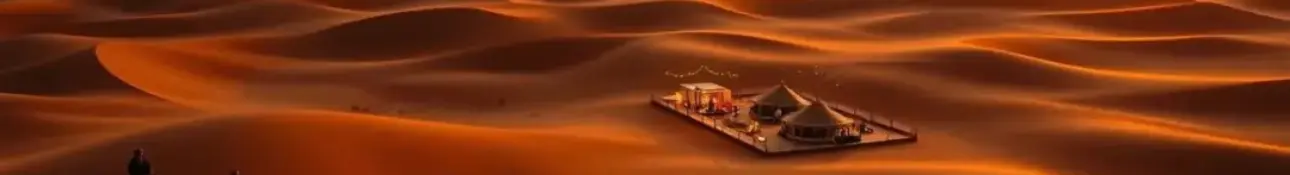Tourists enjoying an evening desert safari in Dubai with camel rides, sand dunes, and a golden sunset in the vast desert landscape.